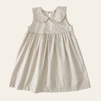 Elma Colette Dress in Haru Blossom Iris, featuring delicate purple florals on Japanese-milled cotton, a Peter Pan collar, back ties and a gathered skirt.