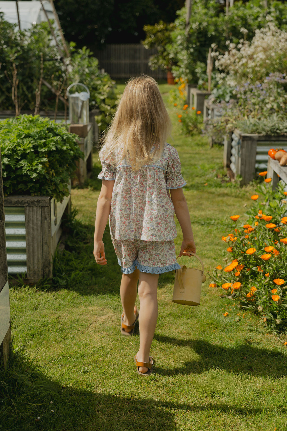 Elma Molly Shorts in Liberty Nancy Ann floral print, featuring embroidered lace trim, an elasticated self-tie waistband and side pockets.
