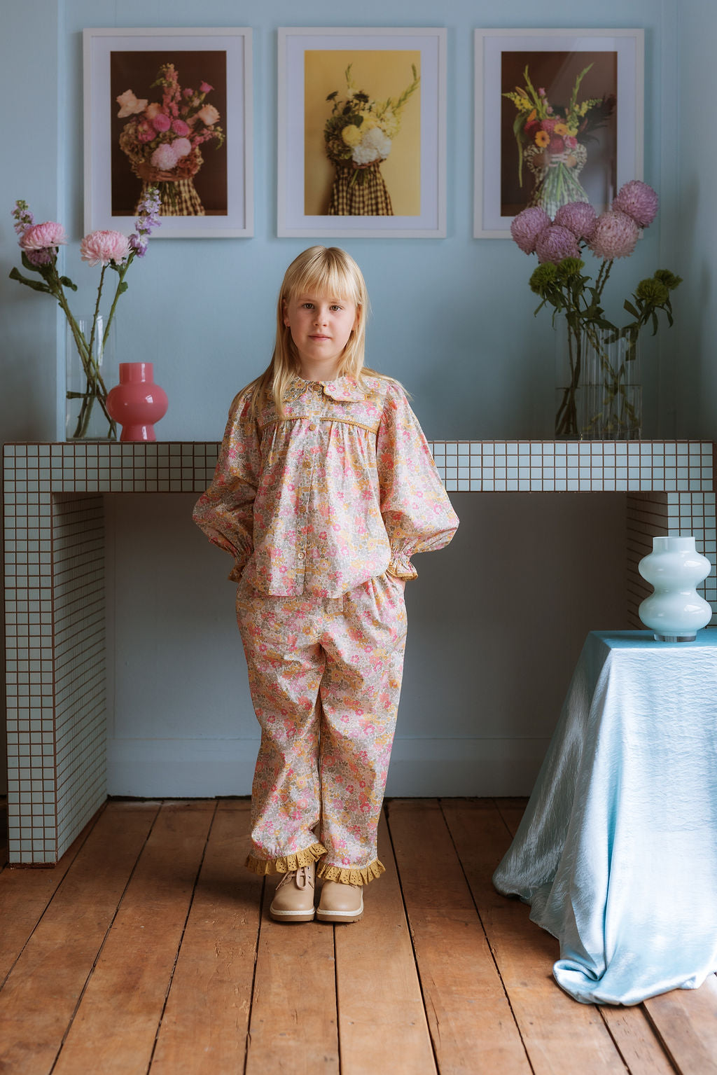 Girl wearing the Margaret Blouse in Liberty Morley Hill floral with scalloped Peter Pan collar and lace trim.
