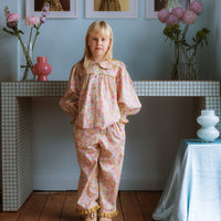 Girl wearing the Margaret Blouse in Liberty Morley Hill floral with scalloped Peter Pan collar and lace trim.
