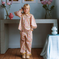 Girl wearing the Margaret Blouse in Liberty Morley Hill floral with scalloped Peter Pan collar and lace trim