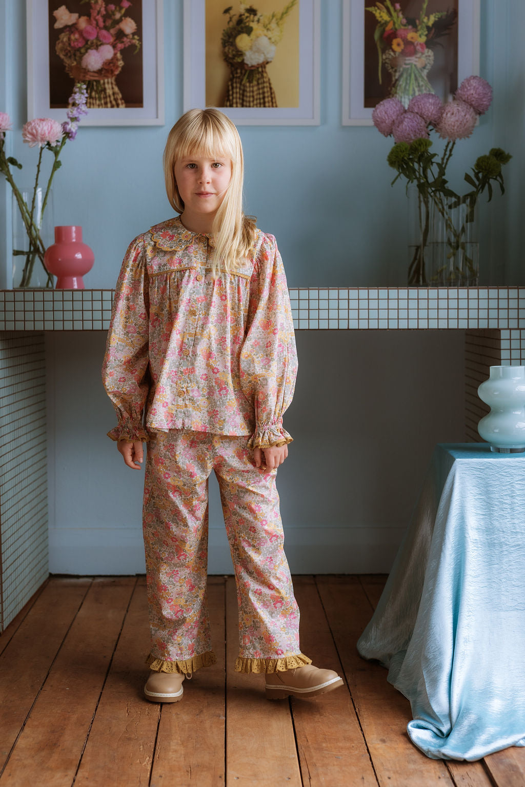 Girl wearing the Margaret Blouse and Lucie Pants in Liberty Morley Hill floral.